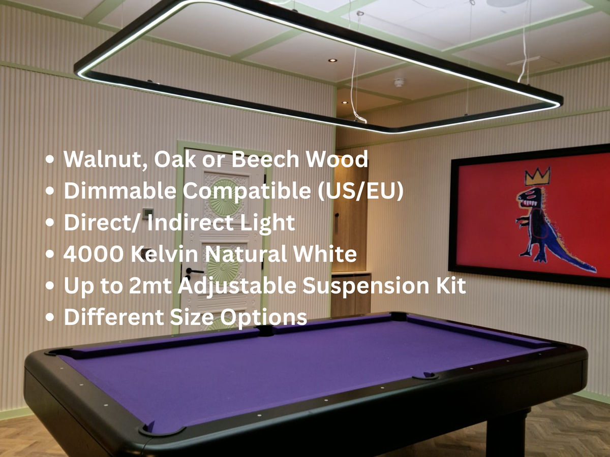 A rectangular black-framed LED light fixture with a white light bar, suspended from the ceiling in a room with a purple pool table. White text on the left lists product features including wood options, dimmability, and light color.