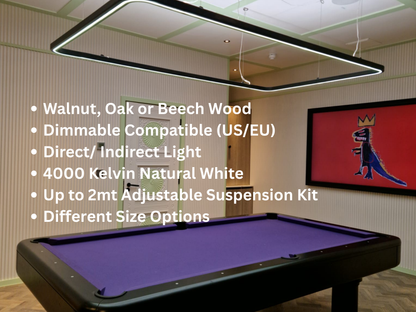 A rectangular black-framed LED light fixture with a white light bar, suspended from the ceiling in a room with a purple pool table. White text on the left lists product features including wood options, dimmability, and light color.
