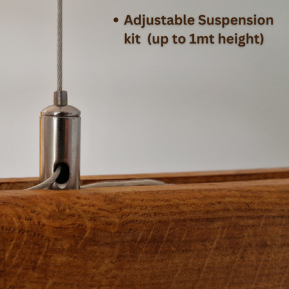 Close-up of a stainless steel adjustable suspension kit component attached to a wooden surface, with text reading 'Adjustable Suspension kit (up to 1mt height)'.