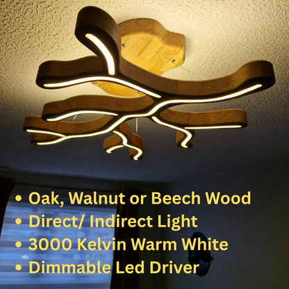 A modern wavy wood ceiling light fixture with integrated warm white LED strips, shown installed on a textured ceiling in a room. Yellow text on the right lists features: Oak, Walnut or Beech Wood, Direct/ Indirect Light, 3000 Kelvin Warm White, and Dimmable Led Driver.