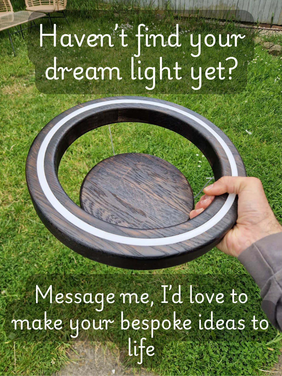 A hand holding a circular wooden light fixture outdoors on a grassy lawn, with overlaid text reading 'Haven't find your dream light yet?' and 'Message me, I'd love to make your bespoke ideas to life'.